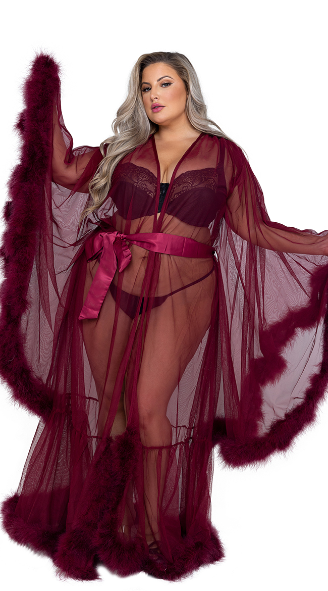 plus size boudoir outfit. woman is wearing a long red transparent robe.